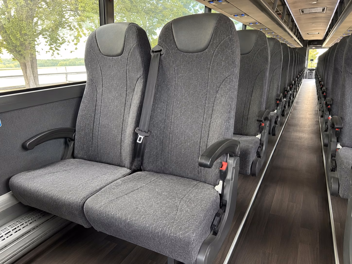 how the day of the week changes bus rental costs in livonia michigan